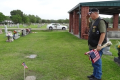 Angleton cemetery Putting out American flags 5-27-17