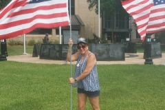 Putting out American Flags at Brazoria County Courthouse 5-20-17
